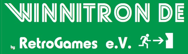 Winnitron Arcade-Automat: Ein grüner Spieleautomat mit Joysticks und Buttons für Indie-Spiele